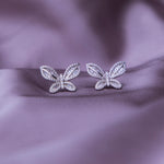 a pair of butterfly silver earrings with zircon