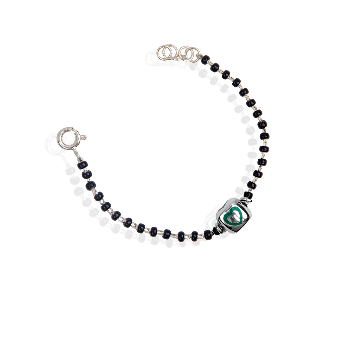 A sterling silver bracelet for kids featuring a green heart charm and black and white beads.