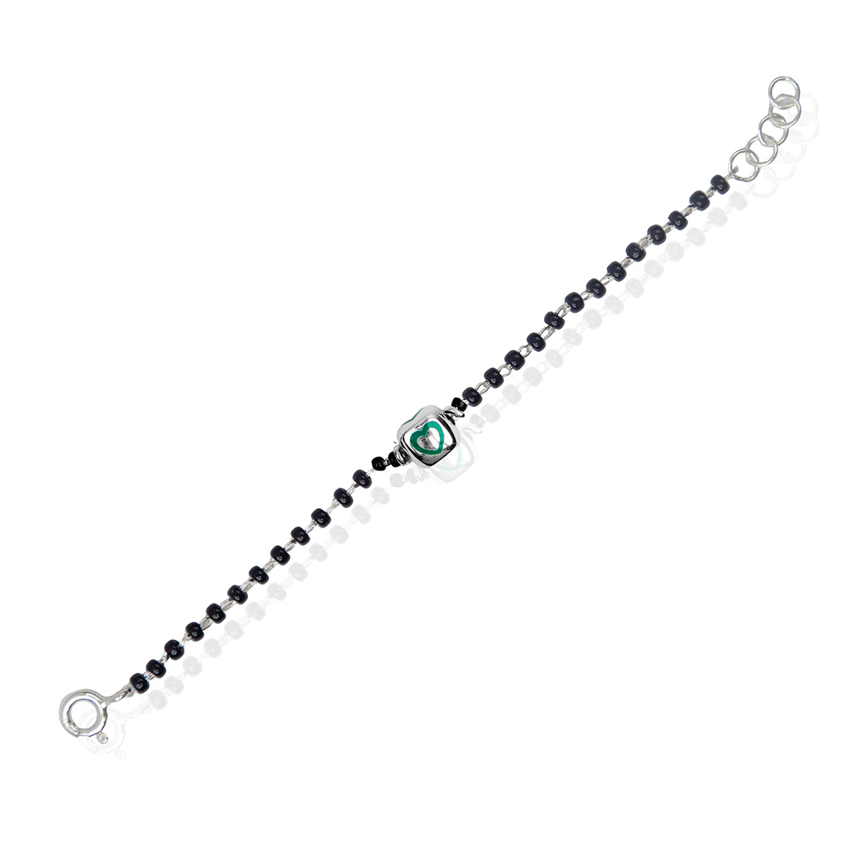 A sterling silver bracelet for kids featuring a green heart charm and black and white beads. Perfect for gifting