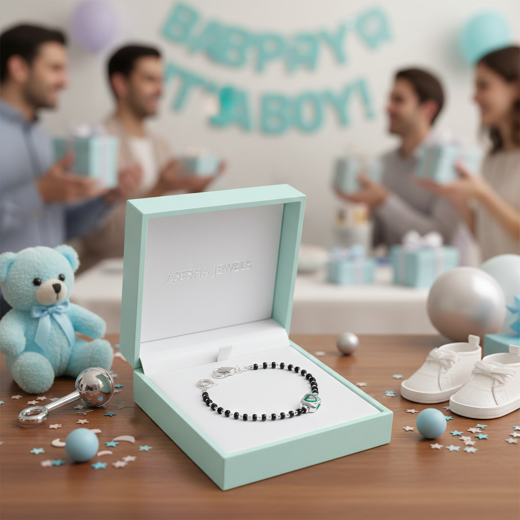 Bracelet in a box with baby-themed items and 'Happy Baby Boy' banner in the background